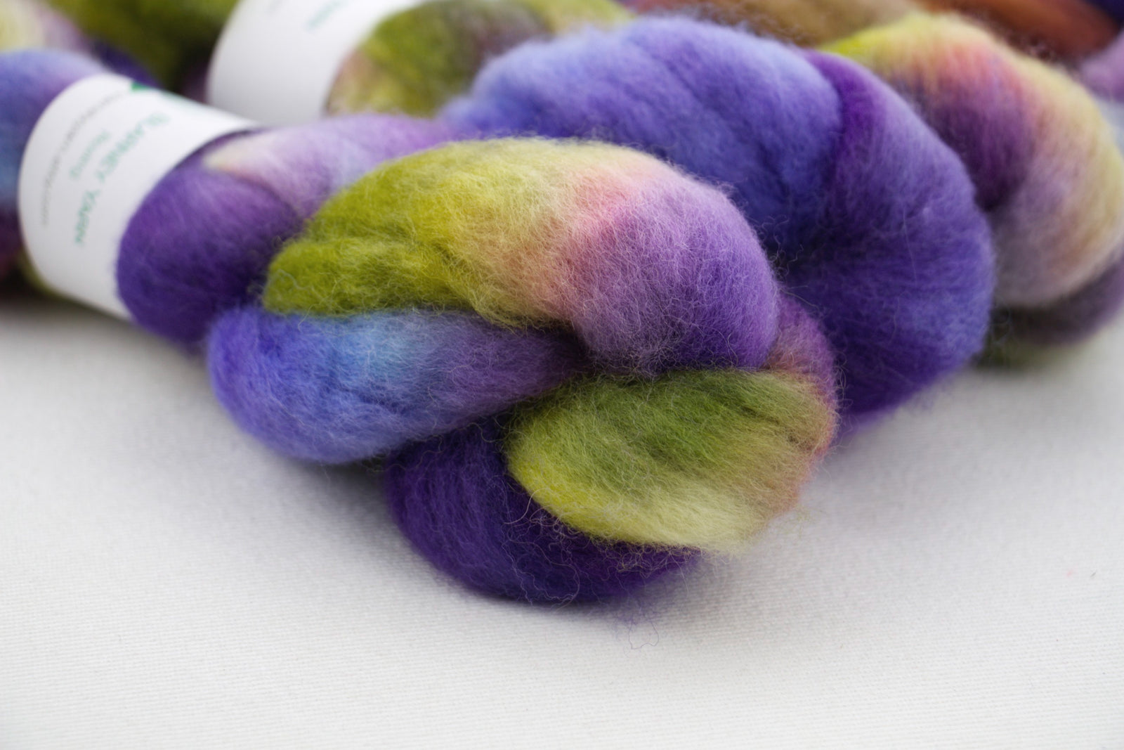 Multicolored fiber skein on a white background